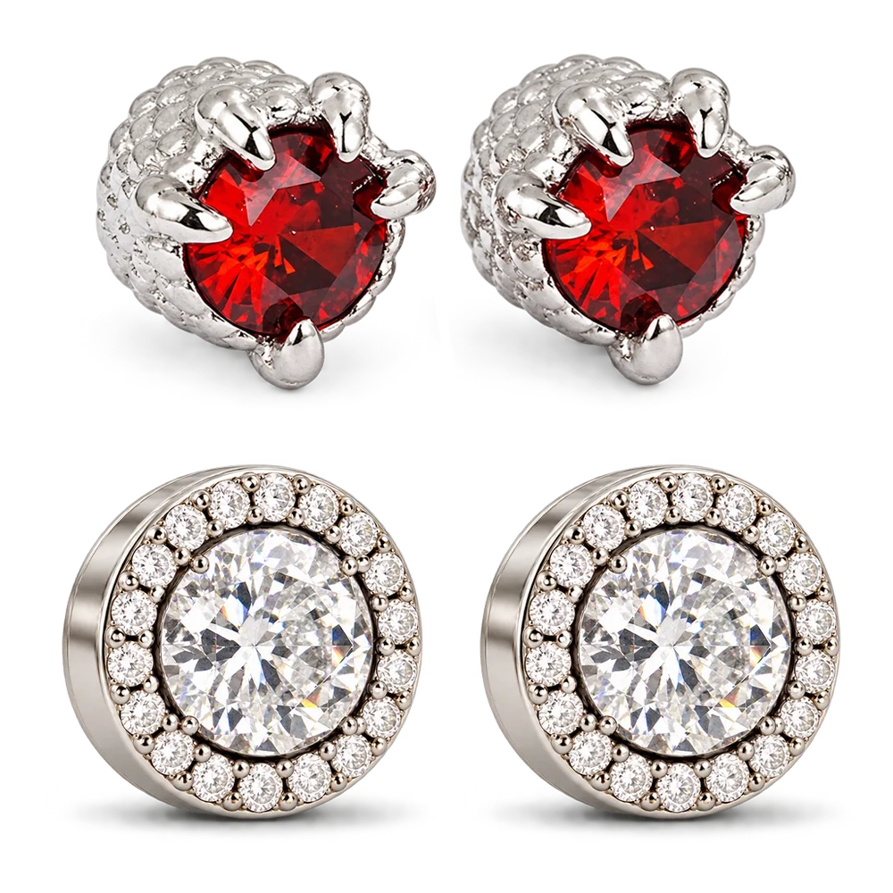 two top earrings feature textured silver settings with large round red stones, and two bottom earrings feature silver settings with a halo of clear stones around a central clear stone.