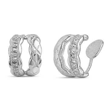 A pair of silver huggie hoop earrings with textured wavy bands and baguette-cut crystal accents, shown on a clean white background.