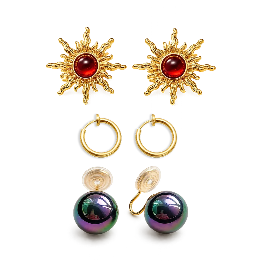 Celestial Glow Trio Clip-On Earring Set featuring gold hoops, sun motifs with red stones, and iridescent spheres on white background