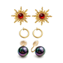 Celestial Glow Trio Clip-On Earring Set featuring gold hoops, sun motifs with red stones, and iridescent spheres on white background