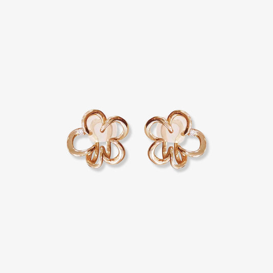 A pair of Cherry Blossom Floral Helix Ear Cuffs in rose gold, designed with circular patterns forming a cherry blossom and enhanced by a zircon center.