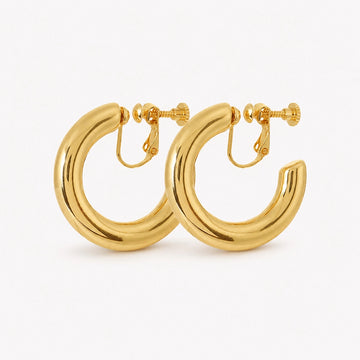 Gold classic hoop clip on earrings displayed front view on white background showing polished finish and screw back closure