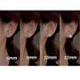 Four side-by-side close-up views of a woman's ear wearing pearl stud earrings in different sizes labeled 6mm, 8mm, 10mm, and 12mm.