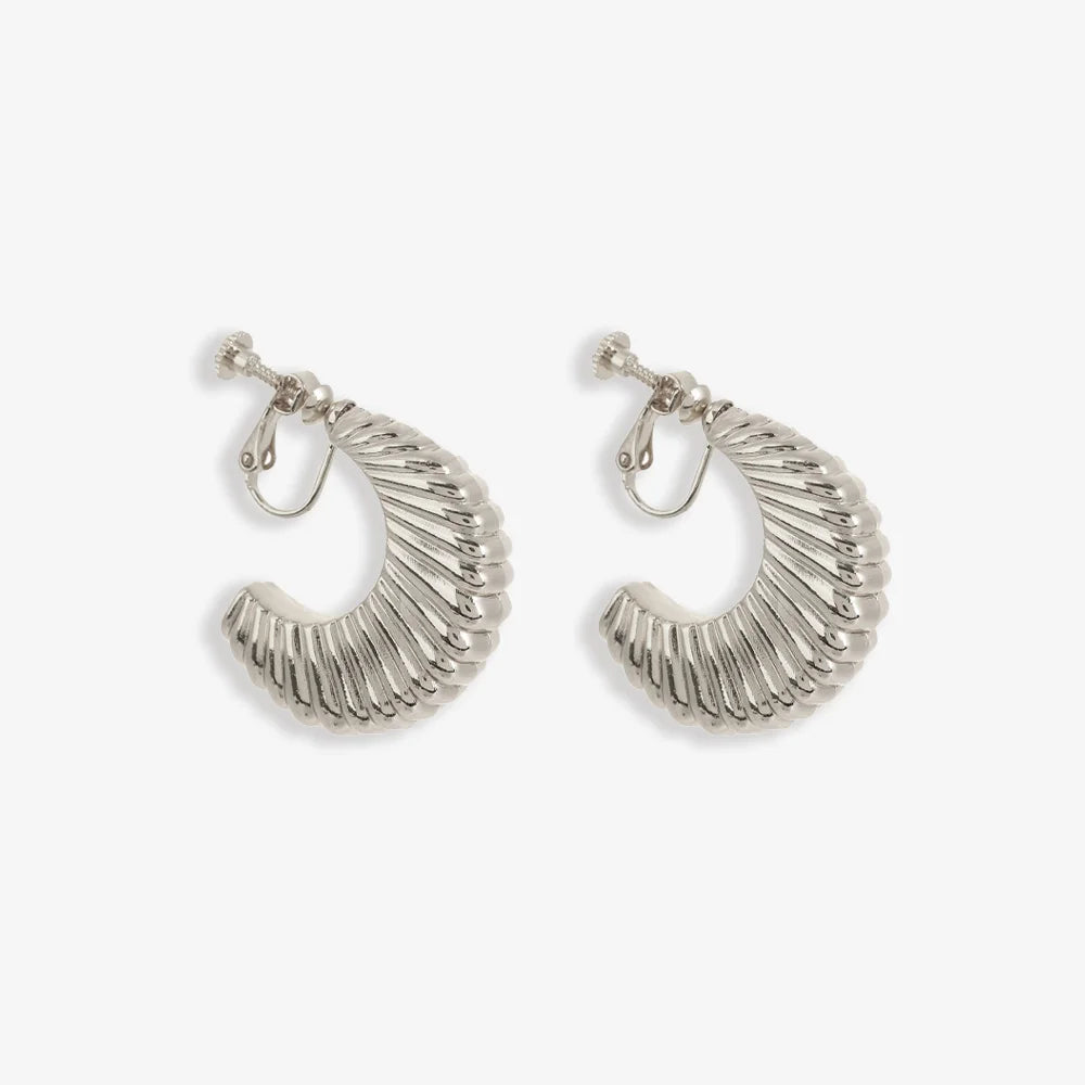 Silver croissant semi hoop clip on earrings front view on white background