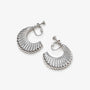 Silver croissant semi hoop clip-on earrings displayed, showing detailed ridged texture and shine from above