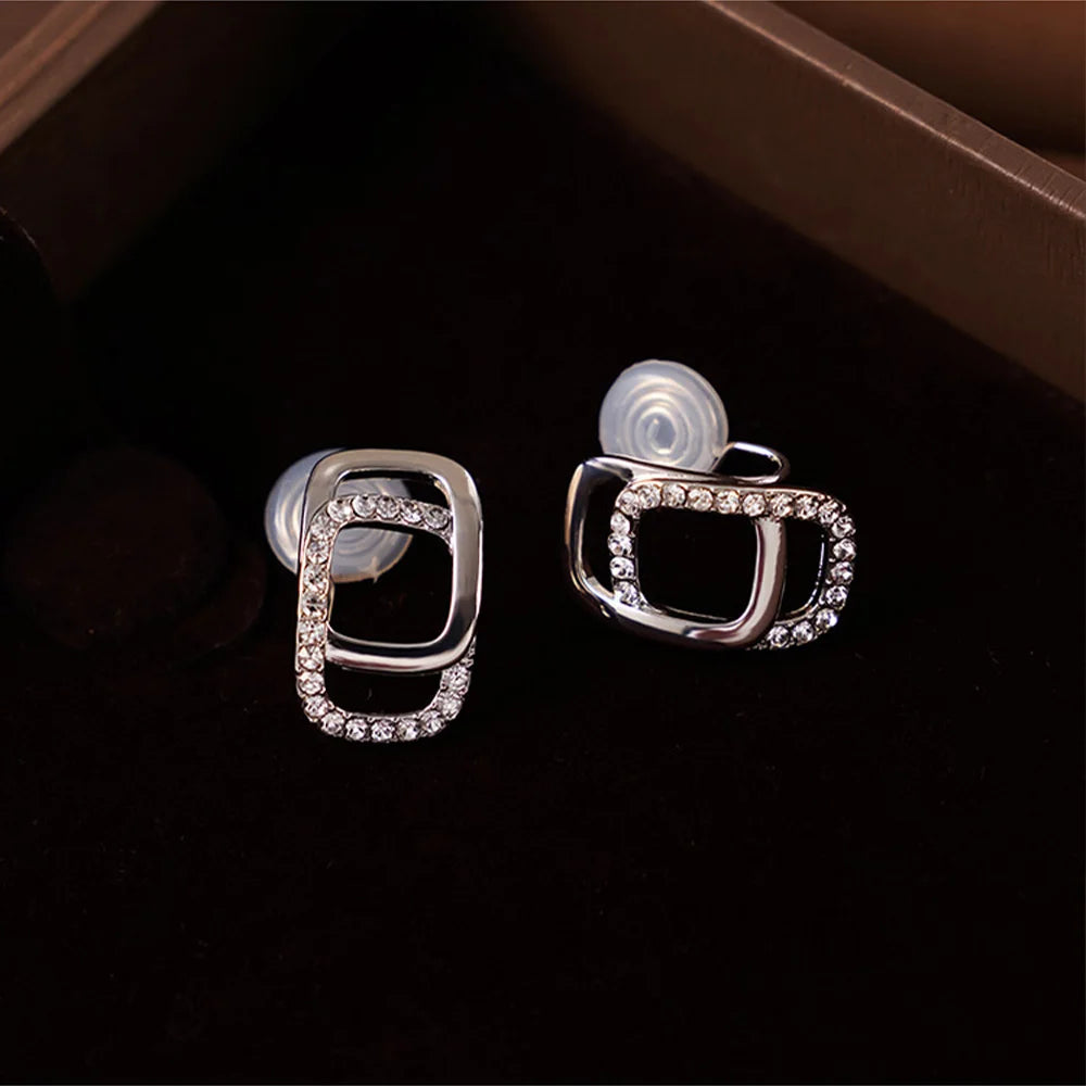 Detailed view of the rectangular zircon frame on Crystal Frame Clip-On Earrings.