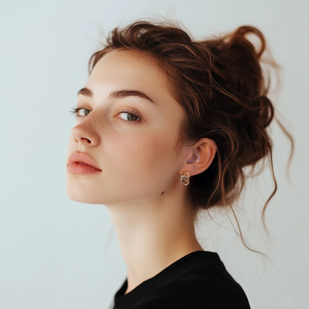 Crystal Frame Clip-On Earrings worn by a model, highlighting their rectangular design and sparkling zircons.