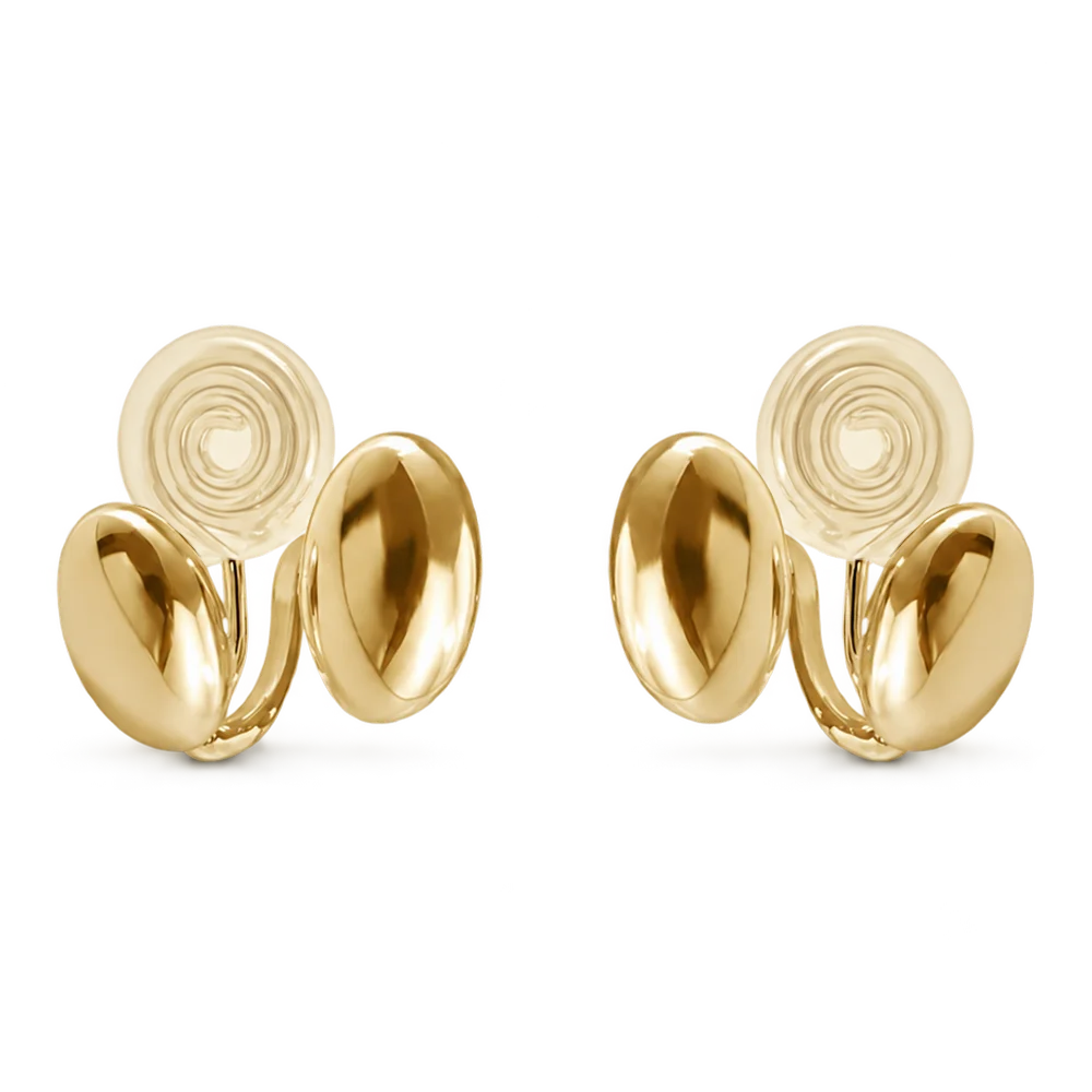 A pair of gold clip-on earrings with a polished, organic wavy shape and a circular spiral stud back, shown on a plain white background.