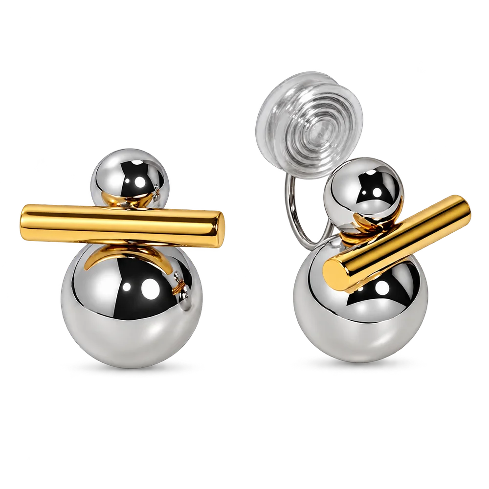 A pair of clip on earrings designed like stylized snowmen, featuring polished silver-tone spheres and a gold-tone stick