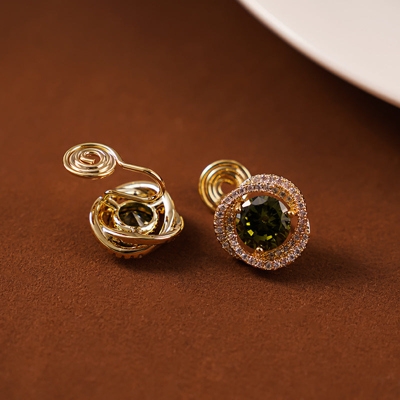 18k gold-plated earrings with large emerald and white zircon stones, clip-on style.