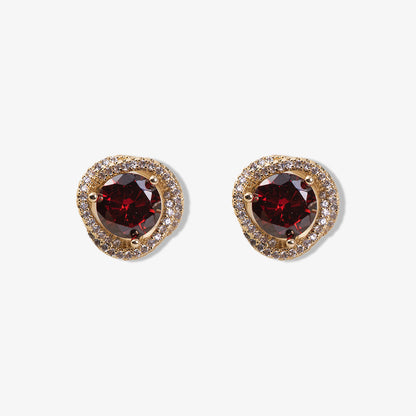 Large ruby zircon clip-on earrings with white zircon accents in 18k gold-plated setting.