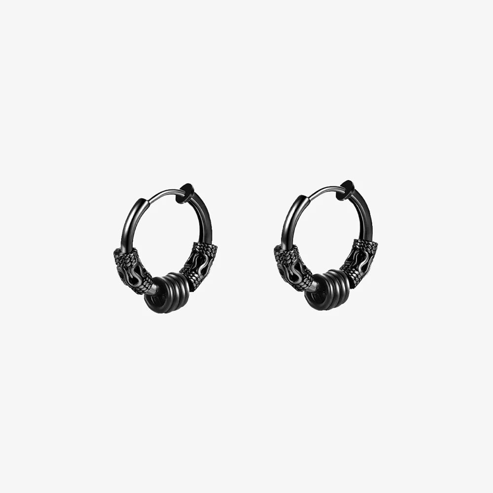 Pair of Embrace Clip-On Hoop Earrings in Black showcasing the intricate design.