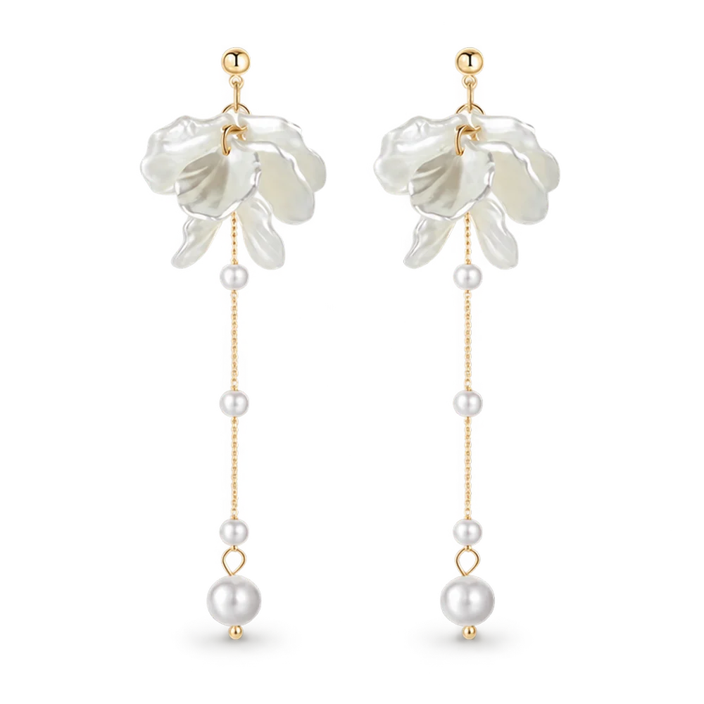 A pair of long dangle earrings featuring white flower-shaped charms, gold posts, and white pearl beads hanging from delicate gold chains