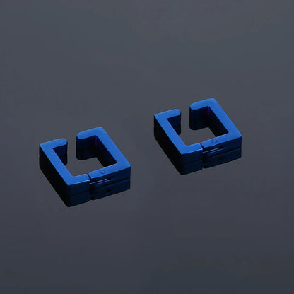 Pair of Geometric Square Clip-On Earrings in Blue on display.