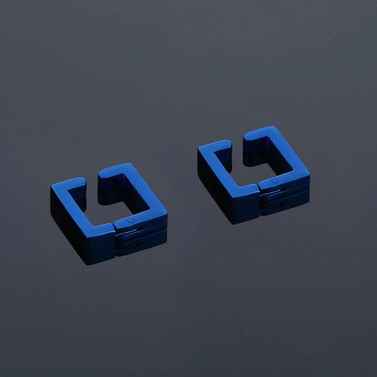 Pair of Geometric Square Clip-On Earrings in Blue on display.