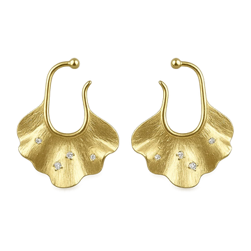 Gold Ginkgo Leaf Ear Cuff Earrings set on a white surface, featuring sparkling white zircon inlays that capture the light, reflecting the organic beauty and luxury of the conch cuff earrings.