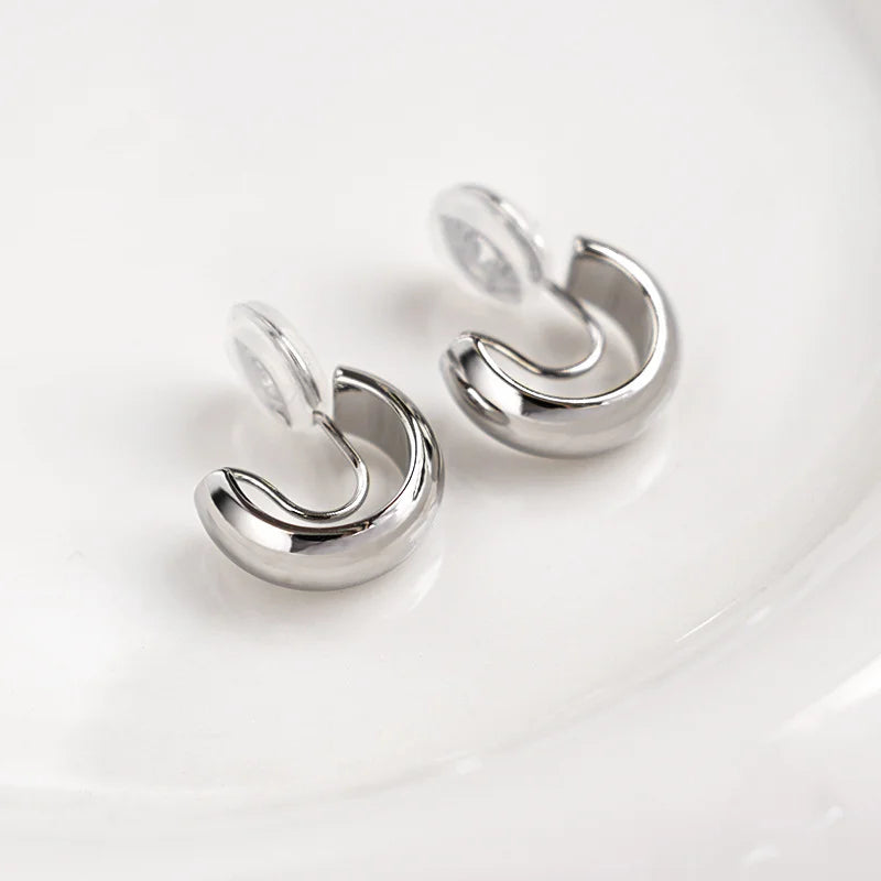 Silver clip on hoop earrings featuring a sleek glossy finish and U-type clip-on design