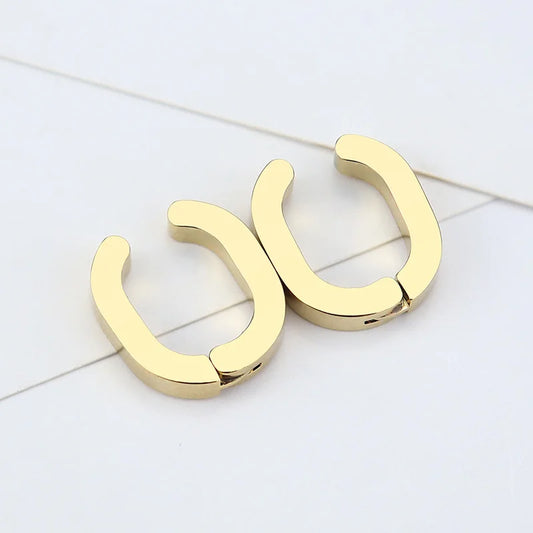 Gold Horseshoe Clip-On Hoop Earrings close-up.