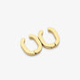 A pair of gold-toned, open hoop earrings with a polished finish, displayed on a clean, light gray background.