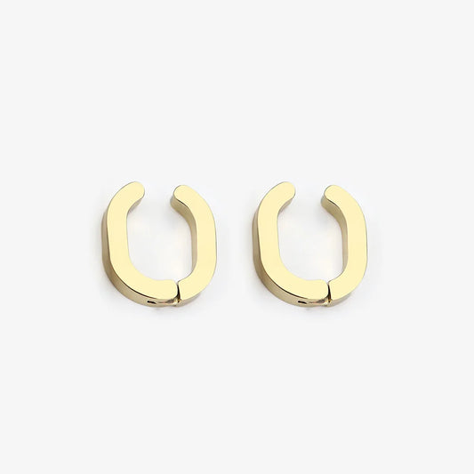 Pair of Gold Horseshoe Clip-On Hoop Earrings displayed on a white background.