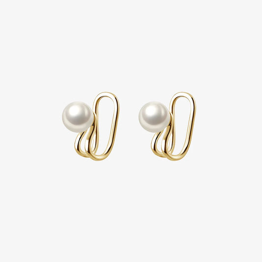 Minimalist Sterling Silver Pearl Ear Cuff in Gold close-up view