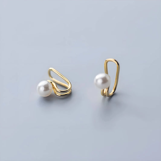 Pearl Ear Cuff in gold on display