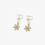 Gold snowflake zirconia clip-on earrings with pearl accents, front view on white background