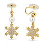 A pair of gold-toned dangle earrings with clear crystal snowflake charms, a white faux pearl, shown on a white background.
