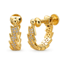 A pair of gold huggie hoop earrings with a textured, layered chevron design paved with small clear cubic zirconia stones, shown on a solid white background.