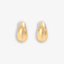 Minimalist gold chunky drop clip-on earrings with a smooth, bean-shaped design, crafted from a gold tone copper alloy. These stylish stud earrings feature a secure hinge-back closure, ideal for easy wear and a comfortable fit for non-pierced ears.
