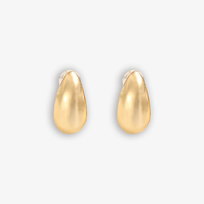 Minimalist gold chunky drop clip-on earrings with a smooth, bean-shaped design, crafted from a gold tone copper alloy. These stylish stud earrings feature a secure hinge-back closure, ideal for easy wear and a comfortable fit for non-pierced ears.