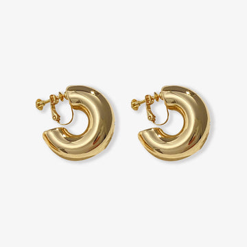 Boucles d'oreilles créoles à clip, couleur or, audacieuses et modernes, avec fermoir à vis en alliage de cuivre. Boucles d'oreilles huggies idéales pour celles qui recherchent un accessoire à la fois classique et remarquable.