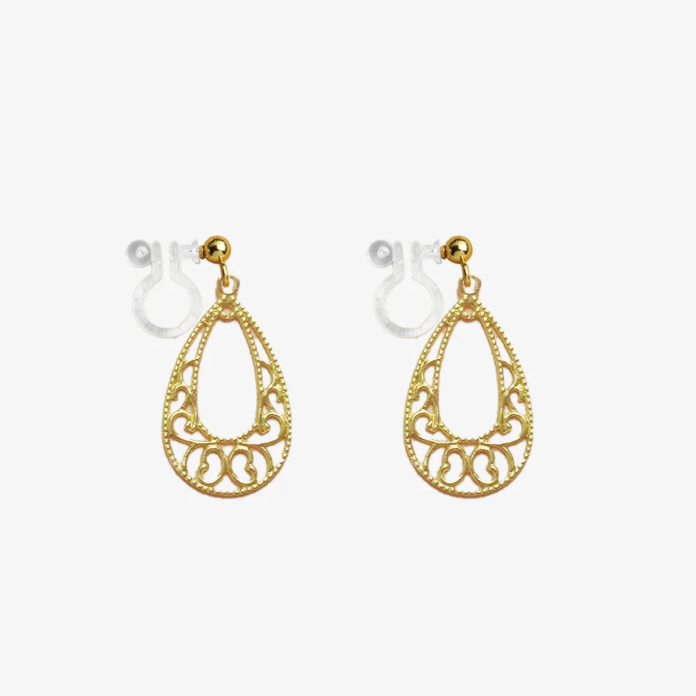 Golden Filigree Teardrop Invisible Clip-On Earrings with intricate design, lightweight and perfect for women.
