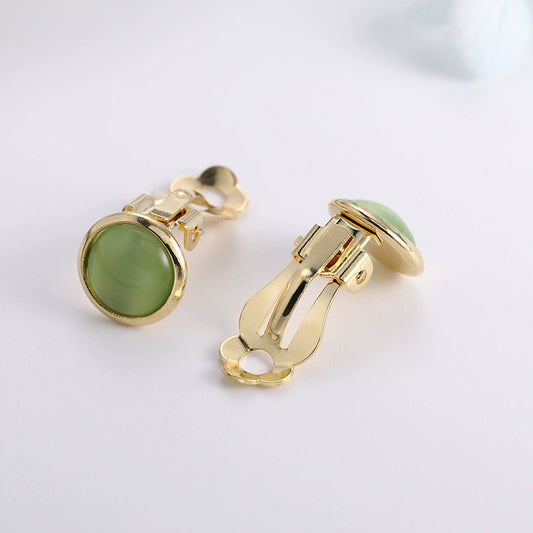 Close-up of vintage fake earrings for women with clip backing

