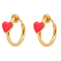 A pair of gold hoop earrings with a small, polished red heart charm attached to each hoop, shown against a plain white background.