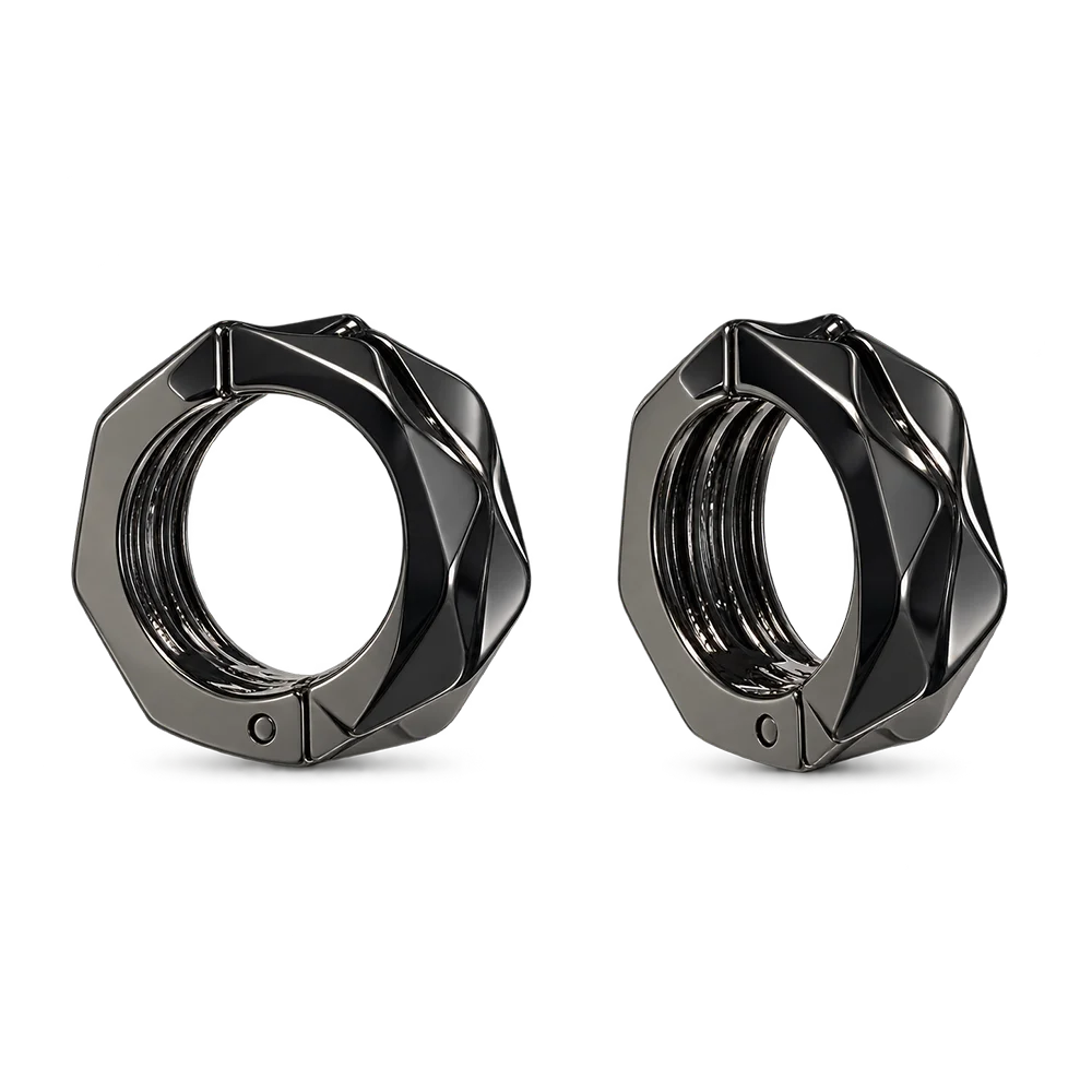 Two black faceted metal clip on earrings with a threaded center, shown side by side on a plain white background.