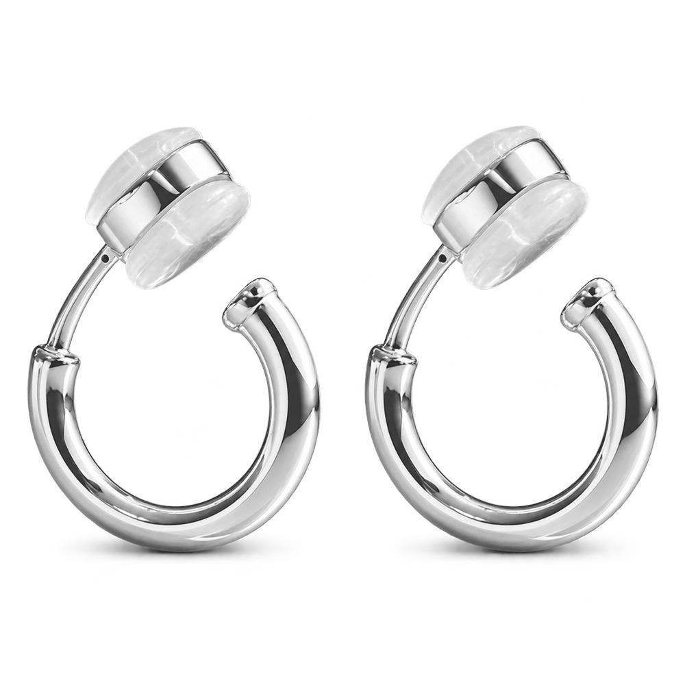 18K white-gold-plated huggie clip-on hoop earrings with a cool silver-tone finish on a white background.