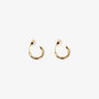 A pair of gold-colored clip-on huggie hoop earrings with a sleek, classic design.