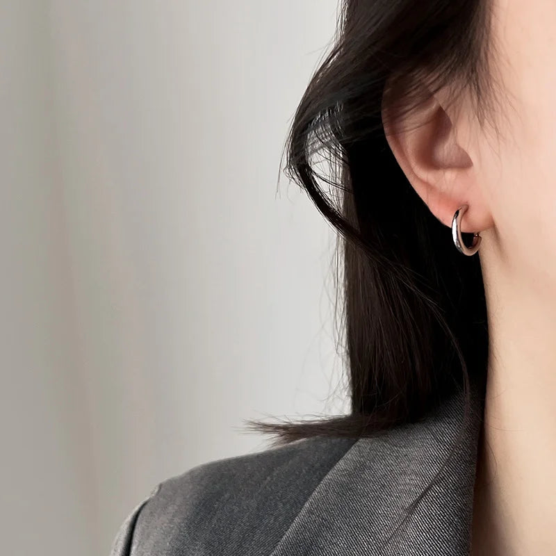Huggie Hoop Clip On Earrings In White Gold