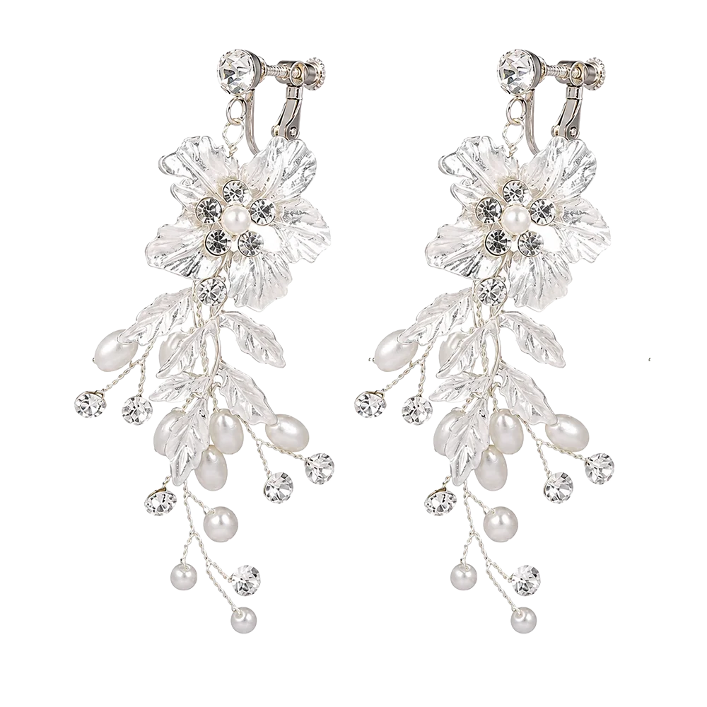 A pair of silver-toned clip-on earrings featuring clear rhinestone-embellished flowers, faux pearl leaves, and dangling pearl beads on a plain white background.