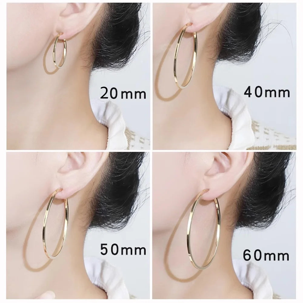 Gold large hoop clip-on earrings size comparison 20mm to 60mm shown on ear from side angle