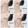 Gold large hoop clip-on earrings size comparison 20mm to 60mm shown on ear from side angle