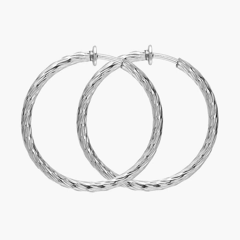Large twisted textured silver hoop clip-on earrings front view on white background
