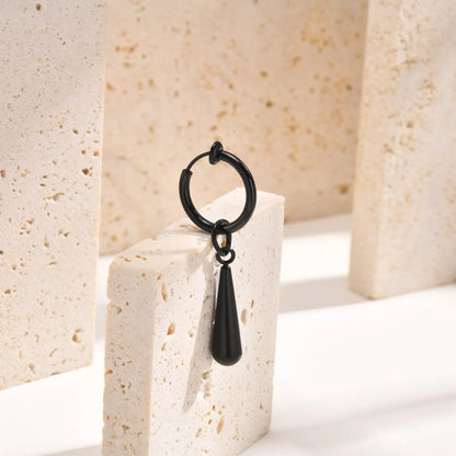 Close-up of Black Clip-On Drop Earrings showcasing bold and modern men’s fake earrings design.