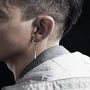 Model wearing Silver Long Drop Clip-On Hoop Earrings, adding a contemporary touch to his look.