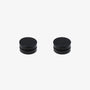 Close-up of matte black round magnetic earring for male, highlighting the smooth, non-reflective finish.