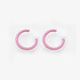 Pink mini glow clip-on hoop earrings front view on white background
