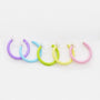 Mini glow clip-on hoop earrings in yellow, blue, purple and pink arranged in a row on white background