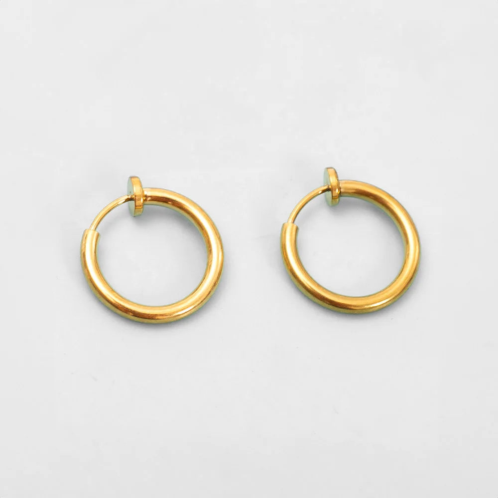 Gold mini hoop clip-on earrings front view on white background, showcasing polished round design