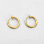 Gold mini hoop clip-on earrings front view on white background, showcasing polished round design